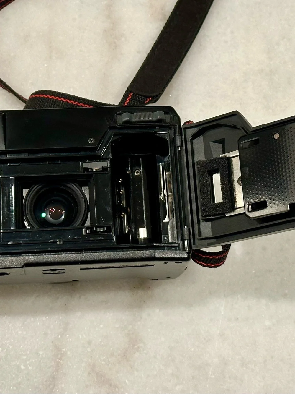 Pentax Black Point-and-Shoot Film Camera with Red-Trim Strap
